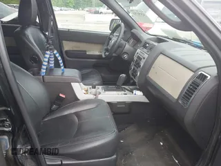 2009 Mercury Mariner Premier with VIN 4M2CU97749KJ15320, listed as a IAAI auction lot 42450753 with 182,172 mi miles and . Bid and sale history available at DreamBid. Image 5.