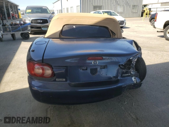 2002 Mazda MX-5 Miata Cloth z VIN JM1NB353220222868, wystawiony jako Copart lot #59944345 z przebiegiem 159 595 mil mil oraz Szkoda całkowita • Salvage title. Historia ofert i sprzedaży dostępna na DreamBid. Obrazek 6.