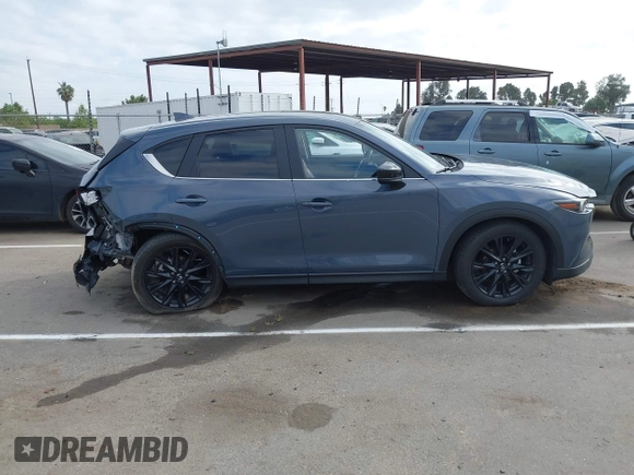 2023 Mazda CX-5 2.5 S Preferred Package with VIN JM3KFBCM0P0255265, listed as a IAAI auction lot 42066175 with 43,213 mi miles. Bid and sale history available at carsss.com. Image 13.