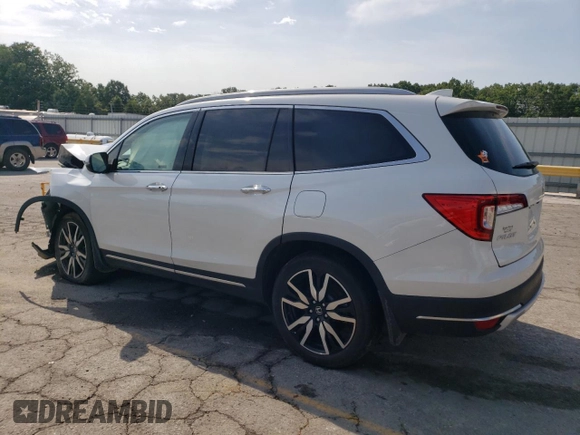 2022 Honda Pilot Touring 7-Passenger with VIN 5FNYF6H64NB054732, listed as a Copart auction lot 63036104 with 33,252 mi miles and Salvage Title. Bid and sale history available at carsss.com. Image 2.
