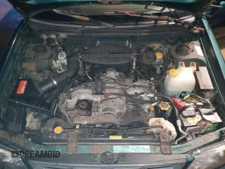 1999 Subaru Forester L with VIN JF1SF6351XH717087, listed as a Copart auction lot 85509274 with 59,695 mi miles and Salvage Title. Bid and sale history available at carsss.com. Image 11.