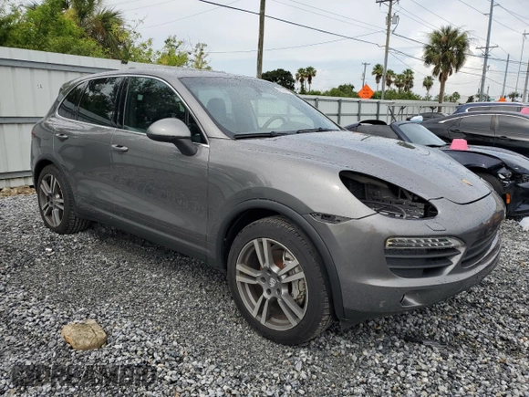 2011 Porsche Cayenne S with VIN WP1AB2A2XBLA55565, listed as a Copart auction lot 63094305 with 105,250 mi miles and Salvage title. Bid and sale history available at DreamBid. Image 4.
