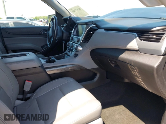 2018 Chevrolet Tahoe LT with VIN 1GNSCBKC0JR138385, listed as a IAAI auction lot 41977300 with 104,987 mi miles and . Bid and sale history available at DreamBid. Image 5.