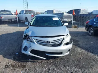 2013 Toyota Corolla L with VIN 5YFBU4EE7DP166021, listed as a IAAI auction lot 42027062 with 179,107 mi miles and . Bid and sale history available at DreamBid. Image 12.