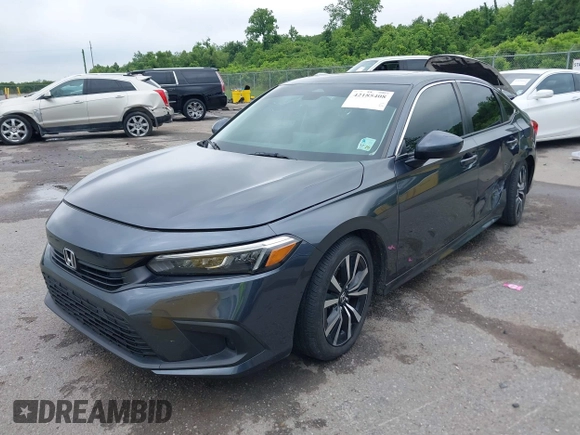 2023 Honda Civic EX with VIN 2HGFE1F73PH312228, listed as a IAAI auction lot 42185408 with 19,339 mi miles and . Bid and sale history available at DreamBid. Image 17.