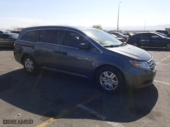 2012 Honda Odyssey LX with VIN 5FNRL5H24CB019934, listed as a Copart auction lot 52412605 with 157,725 mi miles and Salvage Title. Bid and sale history available at carsss.com. Image 4.