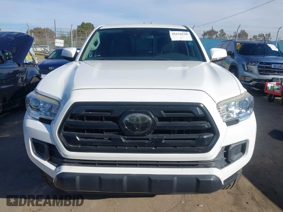 2018 Toyota Tacoma SR with VIN 5TFRX5GN9JX106232, listed as a IAAI auction lot 41634120 with 66,674 mi miles and . Bid and sale history available at DreamBid. Image 12.