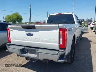 2023 Ford F-250 XL with VIN 1FT7W2BT2PEC30233, listed as a IAAI auction lot 41937400 with 162,574 mi miles and . Bid and sale history available at DreamBid. Image 4.