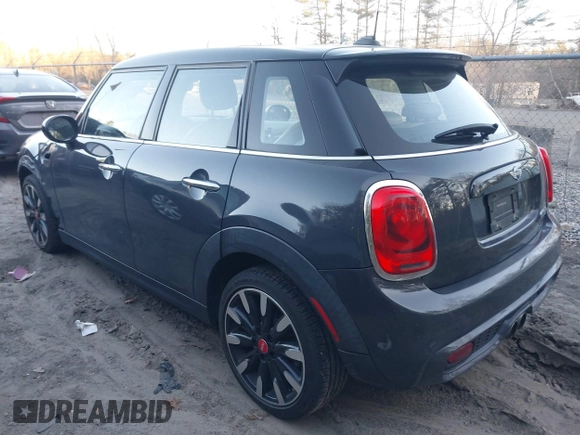 2016 MINI Cooper Hardtop 4 Door S with VIN WMWXU3C56G2B63682, listed as a IAAI auction lot 41244676 with 110,902 mi miles. Bid and sale history available at carsss.com. Image 3.
