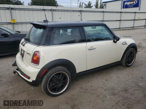 2007 MINI Hardtop S with VIN WMWMF735X7TL83242, listed as a Copart auction lot 41609565 with 83,320 mi miles and Salvage Title. Bid and sale history available at DreamBid. Image 3.