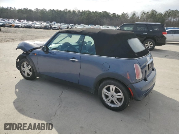 2005 MINI Convertible with VIN WMWRF33555TF62593, listed as a Copart auction lot 48305985 with 172,839 mi miles and Salvage title. Bid and sale history available at DreamBid. Image 2.