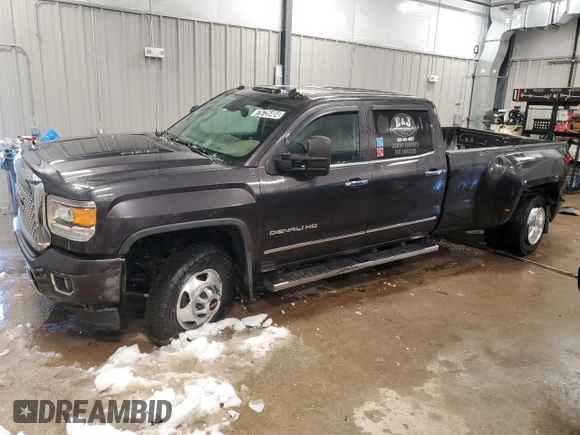 2015 GMC Sierra 3500HD Denali z VIN 1GT424E82FF125315, wystawiony jako Copart lot #79726484 z przebiegiem 147 731 mil mil oraz Czysty tytuł • Clean title. Historia ofert i sprzedaży dostępna na DreamBid. Obrazek 1.