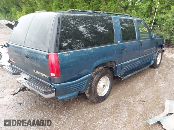 1995 GMC Suburban with VIN 1GDFK16K8SJ741041, listed as a IAAI auction lot 42315676 with 159,312 mi miles and . Bid and sale history available at DreamBid. Image 4.