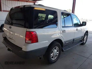2004 Ford Expedition Special Service with VIN 1FMRU15W04LA07318, listed as a IAAI auction lot 41735520 with 231,051 mi miles. Bid and sale history available at carsss.com. Image 4.