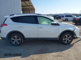 2018 Toyota RAV4 XLE with VIN JTMWFREV7JJ728184, listed as a IAAI auction lot 41377413 with 117,957 mi miles. Bid and sale history available at carsss.com. Image 12.