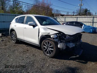 2018 Mazda CX-5 Touring with VIN JM3KFBCM3J0437422, listed as a Copart auction lot 49909575 with 0 mi miles and Salvage Title. Bid and sale history available at carsss.com. Image 4.