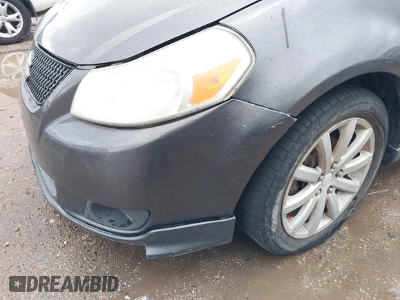 2012 Suzuki SX4 with VIN JS2YC5A55C6300349, listed as a IAAI auction lot 41472004 with 178,487 mi miles and . Bid and sale history available at DreamBid. Image 14.