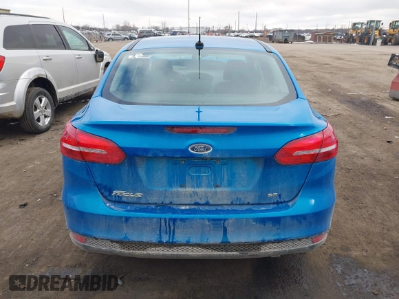 2017 Ford Focus SE with VIN 1FADP3F24HL243981, listed as a IAAI auction lot 40987789 with 56,988 mi miles and . Bid and sale history available at DreamBid. Image 16.