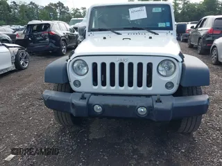 2016 Jeep Wrangler Unlimited Sport z VIN 1C4HJWDG7GL166003, wystawiony jako IAAI lot #42549551 z przebiegiem 96 760 mil mil oraz . Historia ofert i sprzedaży dostępna na DreamBid. Obrazek 12.