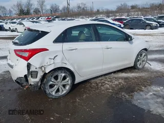 2014 Hyundai Elantra GT with VIN KMHD35LH2EU196462, listed as a IAAI auction lot 41374671 with 132,342 mi miles. Bid and sale history available at carsss.com. Image 4.
