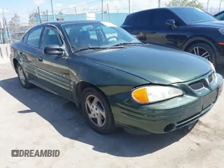 2000 Pontiac Grand Am SE1 with VIN 1G2NF52T0YM808611, listed as a IAAI auction lot 41943125 with 132,887 mi miles. Bid and sale history available at carsss.com. Image 1.