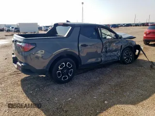 2023 Hyundai Santa Cruz SEL with VIN 5NTJBDAEXPH061824, listed as a Copart auction lot 59975255 with 56,492 mi miles and Salvage title. Bid and sale history available at DreamBid. Image 3.