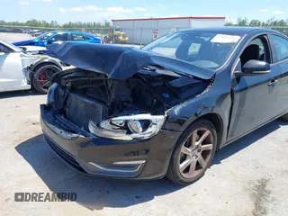 2014 Volvo S60 T5 with VIN YV1612FS1E2294154, listed as a IAAI auction lot 42046636 with 165,257 mi miles. Bid and sale history available at carsss.com. Image 6.