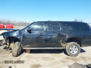 2011 Chevrolet Suburban LT with VIN 1GNSKJE30BR201074, listed as a IAAI auction lot 41986073 with 182,611 mi miles. Bid and sale history available at carsss.com. Image 14.