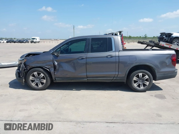 2019 Honda Ridgeline RTL with VIN 5FPYK2F59KB004653, listed as a IAAI auction lot 42066778 with 90,144 mi miles and . Bid and sale history available at DreamBid. Image 14.