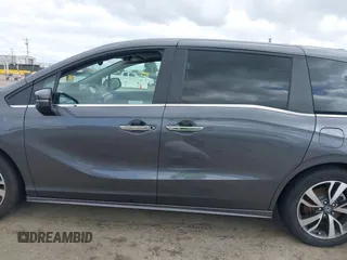 2023 Honda Odyssey Touring with VIN 5FNRL6H81PB047495, listed as a IAAI auction lot 41919967 with Not Provided miles and . Bid and sale history available at DreamBid. Image 15.