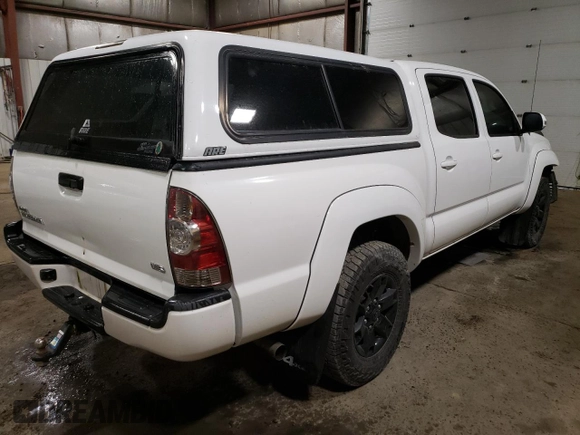 2015 Toyota Tacoma with VIN 5TFLU4EN2FX112036, listed as a Copart auction lot 50275385 with 135,503 mi miles and Salvage Title. Bid and sale history available at DreamBid. Image 3.