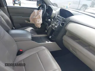 2014 Honda Pilot EX-L with VIN 5FNYF4H52EB055549, listed as a IAAI auction lot 42086456 with 292,594 mi miles and . Bid and sale history available at carsss.com. Image 5.