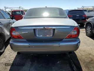 2006 Jaguar XJ Vanden Plas with VIN SAJWA82BX6SH09069, listed as a Copart auction lot 68122604 with 153,999 mi miles and Salvage Title. Bid and sale history available at carsss.com. Image 6.