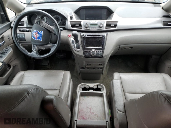 2014 Honda Odyssey Touring z VIN 5FNRL5H91EB063390, wystawiony jako Copart lot #54482545 z przebiegiem Nie podano mil oraz Szkoda całkowita • Salvage title. Historia ofert i sprzedaży dostępna na DreamBid. Obrazek 8.