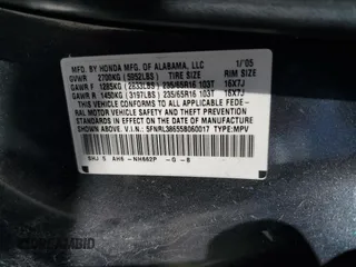 2005 Honda Odyssey EX-L z VIN 5FNRL38655B060017, wystawiony jako Copart lot #55337445 z przebiegiem 206 843 mil mil oraz Czysty tytuł • Clean title. Historia ofert i sprzedaży dostępna na DreamBid. Obrazek 13.