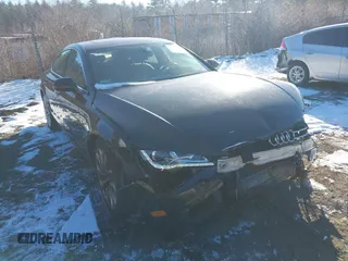 2014 Audi A7 Premium Plus z VIN WAUWGAFC5EN124348, wystawiony jako IAAI lot #41167147 z przebiegiem 93 136 mil mil oraz . Historia ofert i sprzedaży dostępna na DreamBid. Obrazek 1.