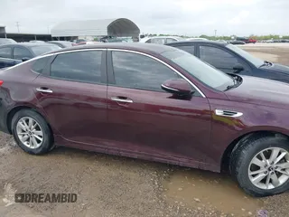 2016 Kia Optima LX with VIN 5XXGT4L3XGG027430, listed as a IAAI auction lot 41940146 with 75,456 mi miles and . Bid and sale history available at carsss.com. Image 13.