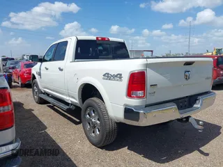 2018 Ram 2500 Laramie with VIN 3C6UR5FL0JG329369, listed as a IAAI auction lot 42539876 with 36,872 mi miles and . Bid and sale history available at DreamBid. Image 3.