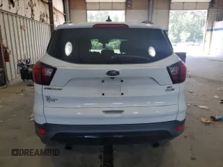 2019 Ford Escape SE z VIN 1FMCU9GD3KUA68315, wystawiony jako Copart lot #56362675 z przebiegiem 158 657 mil mil oraz Czysty tytuł • Clean title. Historia ofert i sprzedaży dostępna na DreamBid. Obrazek 6.