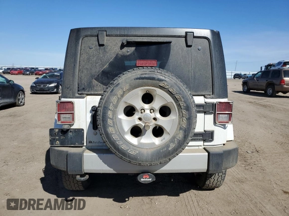 2014 Jeep Wrangler Unlimited Sahara with VIN 1C4BJWEG5EL111115, listed as a Copart auction lot 48385295 with 140,652 mi miles and Salvage Title. Bid and sale history available at carsss.com. Image 6.