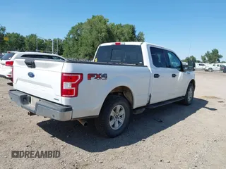 2020 Ford F-150 XL with VIN 1FTFW1E42LKD82678, listed as a IAAI auction lot 42577600 with 141,787 mi miles and . Bid and sale history available at DreamBid. Image 4.