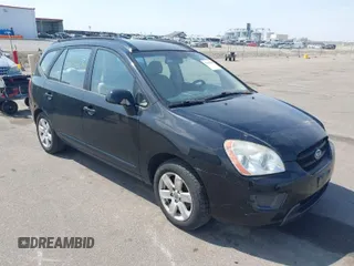 2007 Kia Rondo LX with VIN KNAFG525877029532, listed as a IAAI auction lot 42036604 with 225,698 mi miles. Bid and sale history available at carsss.com. Image 1.