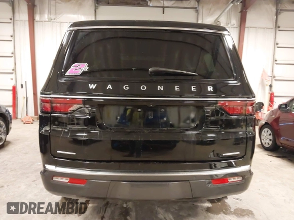 2022 Jeep Wagoneer Series II with VIN 1C4SJVBT5NS127476, listed as a IAAI auction lot 41807474 with 48,703 mi miles and . Bid and sale history available at DreamBid. Image 17.