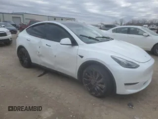 2023 Tesla Model Y Performance with VIN 7SAYGDEF0PF791552, listed as a Copart auction lot 44592545 with 29,075 mi miles and Salvage Title. Bid and sale history available at DreamBid. Image 4.