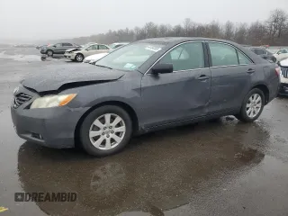 2009 Toyota Camry LE with VIN 4T1BK46K69U579192, listed as a Copart auction lot 44104395 with 154,859 mi miles and Salvage Title. Bid and sale history available at carsss.com. Image 1.