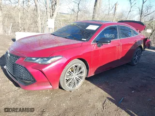 2019 Toyota Avalon XLE with VIN 4T1BZ1FB0KU009172, listed as a IAAI auction lot 41811370 with 106,942 mi miles. Bid and sale history available at carsss.com. Image 2.