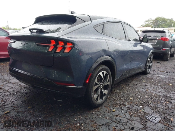 2021 Ford Mustang Mach-E Premium z VIN 3FMTK3RM1MMA06290, wystawiony jako IAAI lot #42200662 z przebiegiem 78 084 mil mil oraz . Historia ofert i sprzedaży dostępna na DreamBid. Obrazek 4.
