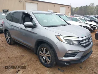 2018 Honda Pilot EX-L with VIN 5FNYF5H50JB022680, listed as a IAAI auction lot 41919787 with 159,205 mi miles and . Bid and sale history available at DreamBid. Image 1.