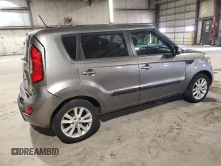 2012 Kia Soul + with VIN KNDJT2A66C7365885, listed as a Copart auction lot 52380495 with 142,149 mi miles and Salvage Title. Bid and sale history available at DreamBid. Image 3.
