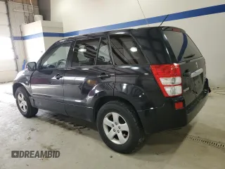 2012 Suzuki Grand Vitara Premium z VIN JS3TD0D66C4100814, wystawiony jako Copart lot #89250025 z przebiegiem 102 381 mil mil oraz Szkody całkowita. Historia ofert i sprzedaży dostępna na DreamBid. Obrazek 2.